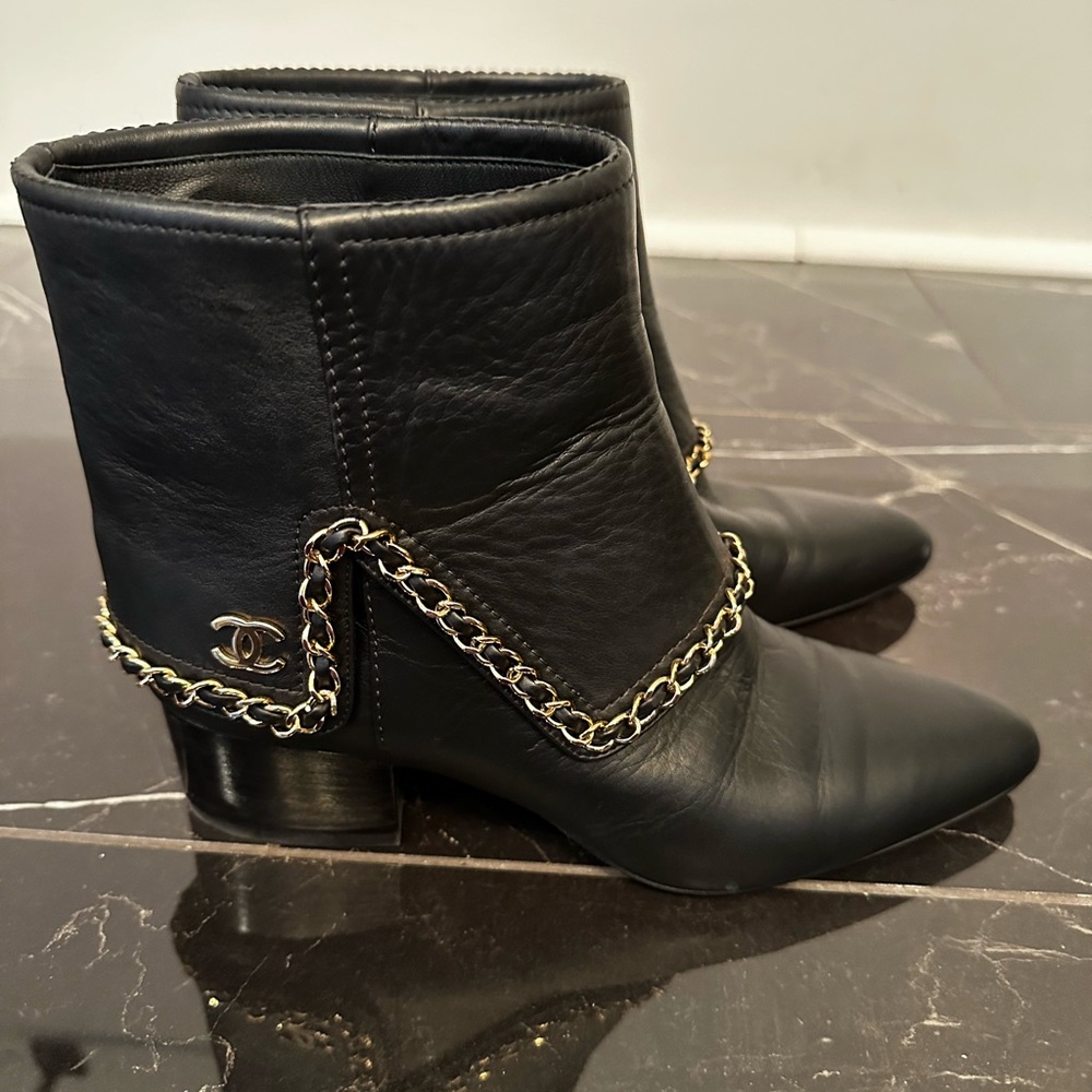 Chanel gold over black bootie with gold hardware
